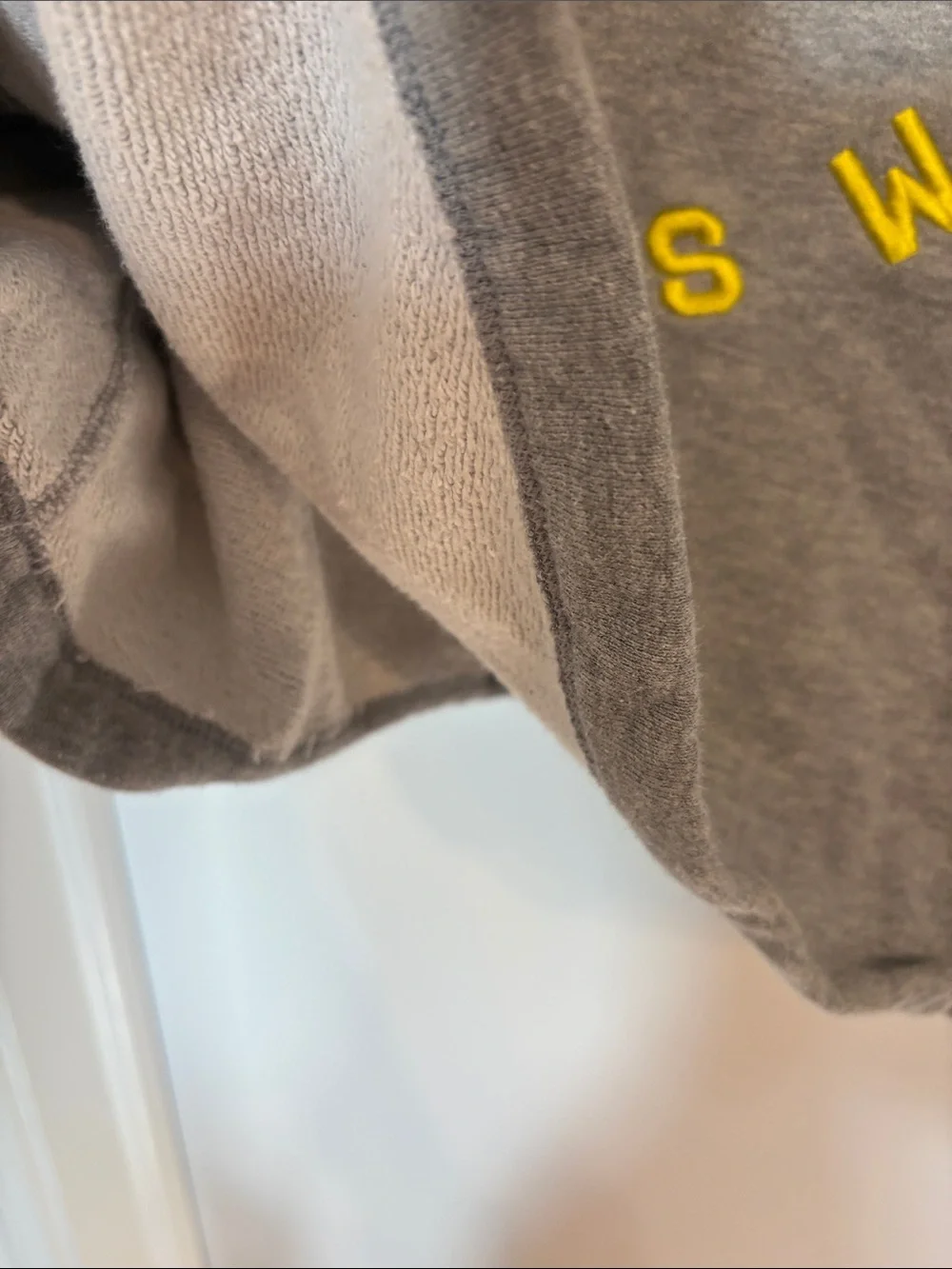Nike Gray Crewneck Sweatshirt with White Swoosh and Yellow 'Sportswear' Text
